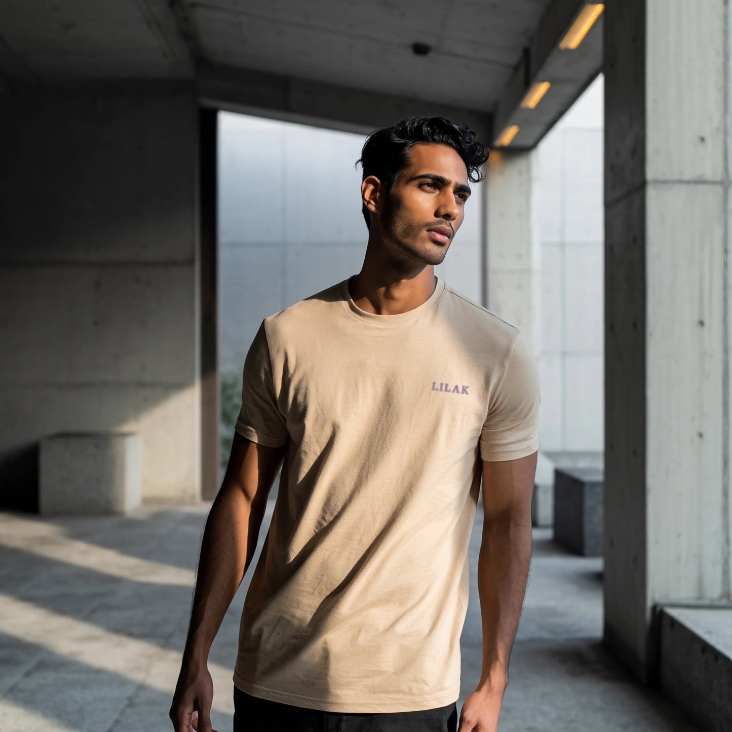 Beige men’s premium Supima cotton t-shirt with clean minimalist branding, breathable luxury lifestyle fashion