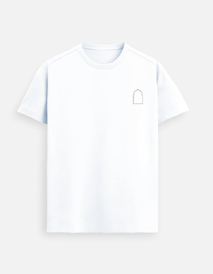 White men’s premium Supima cotton t-shirt with minimalist embroidered emblem, ultra-soft luxury casual wear in natural light