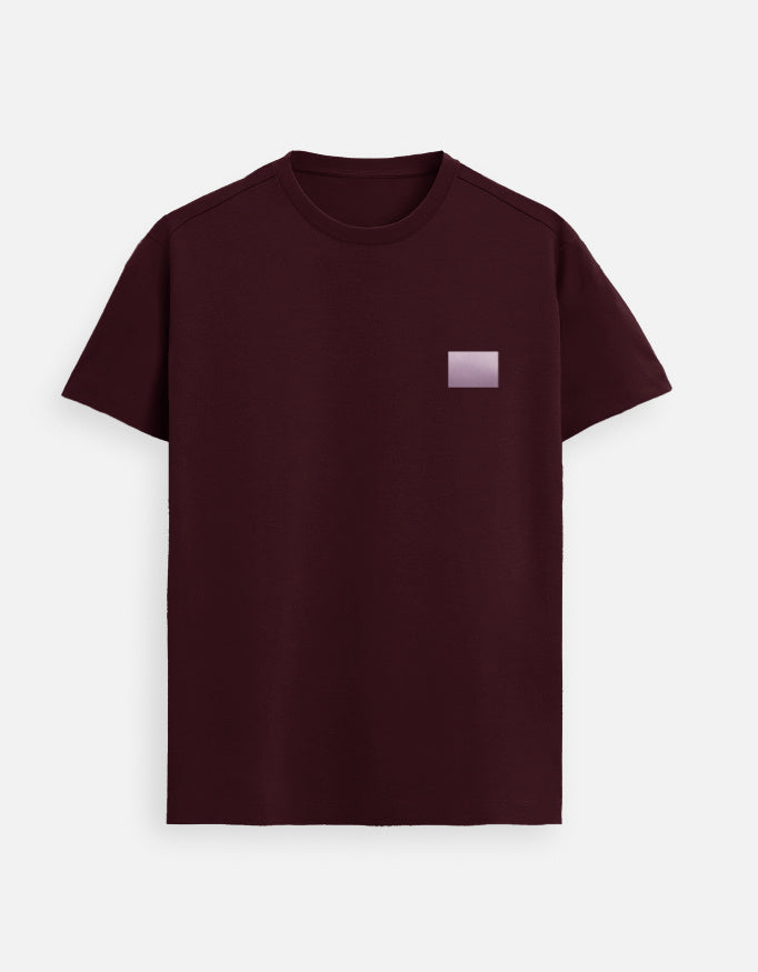 Men’s Maroon minimalist t-shirt featuring a subtle lilac square chest logo, premium cotton casual wear with modern clean design
