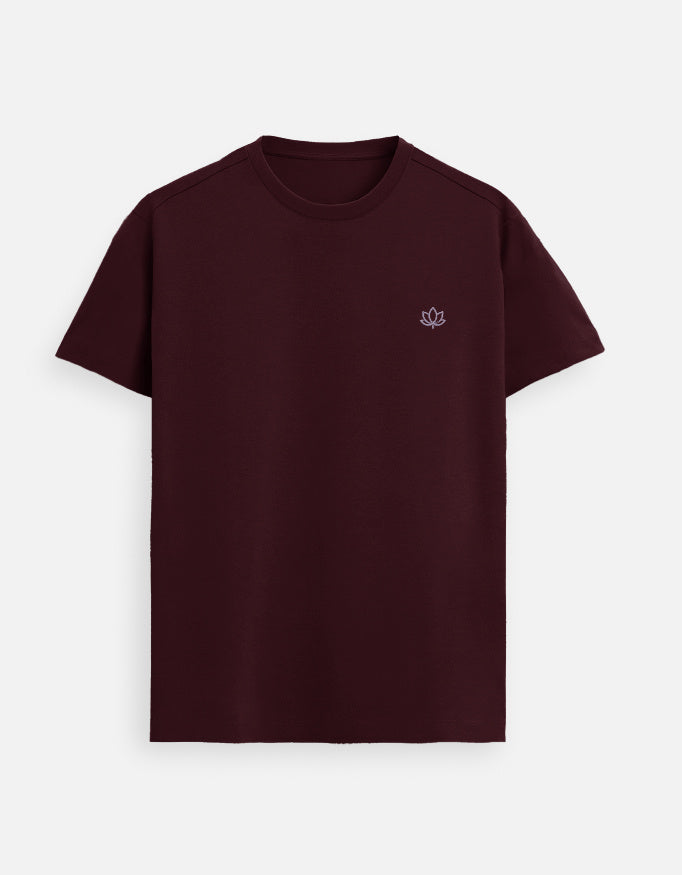 Maroon women’s Supima cotton t-shirt with understated lotus emblem, rich-tone premium casual streetwear