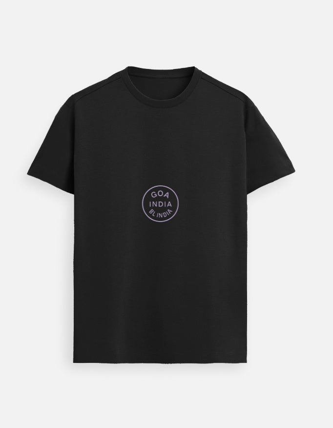 Black women’s premium Supima cotton t-shirt with subtle circular logo print, modern urban streetwear fashion