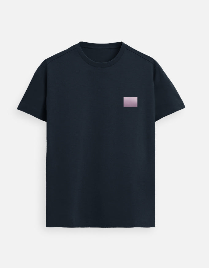 Men’s Navy Blue minimalist t-shirt featuring a subtle lilac square chest logo, premium cotton casual wear with modern clean design