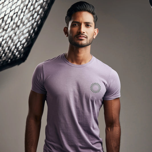 Man wearing a premium supima cotton purple t-shirt with a Warli Circle, standing against a neutral background