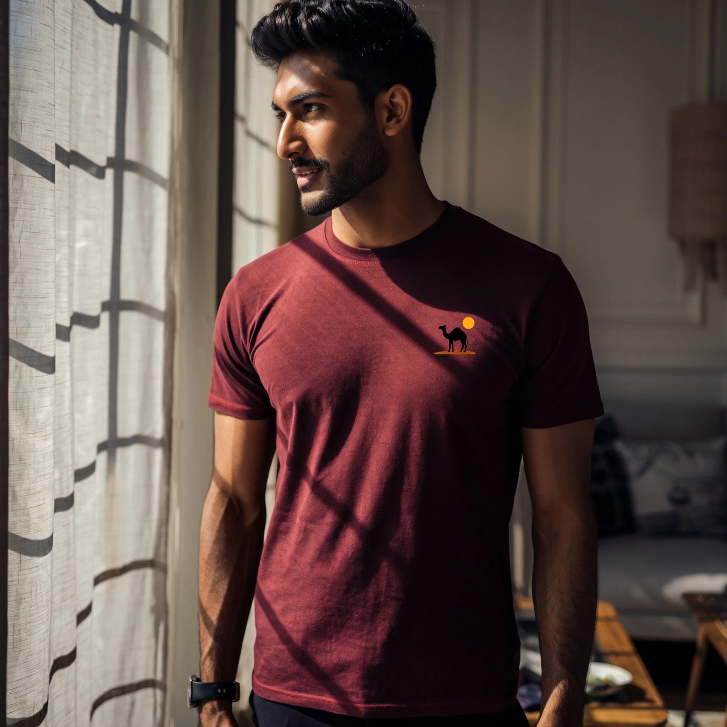 Maroon men’s Supima cotton t-shirt with understated camel emblem, rich-tone premium casual streetwear