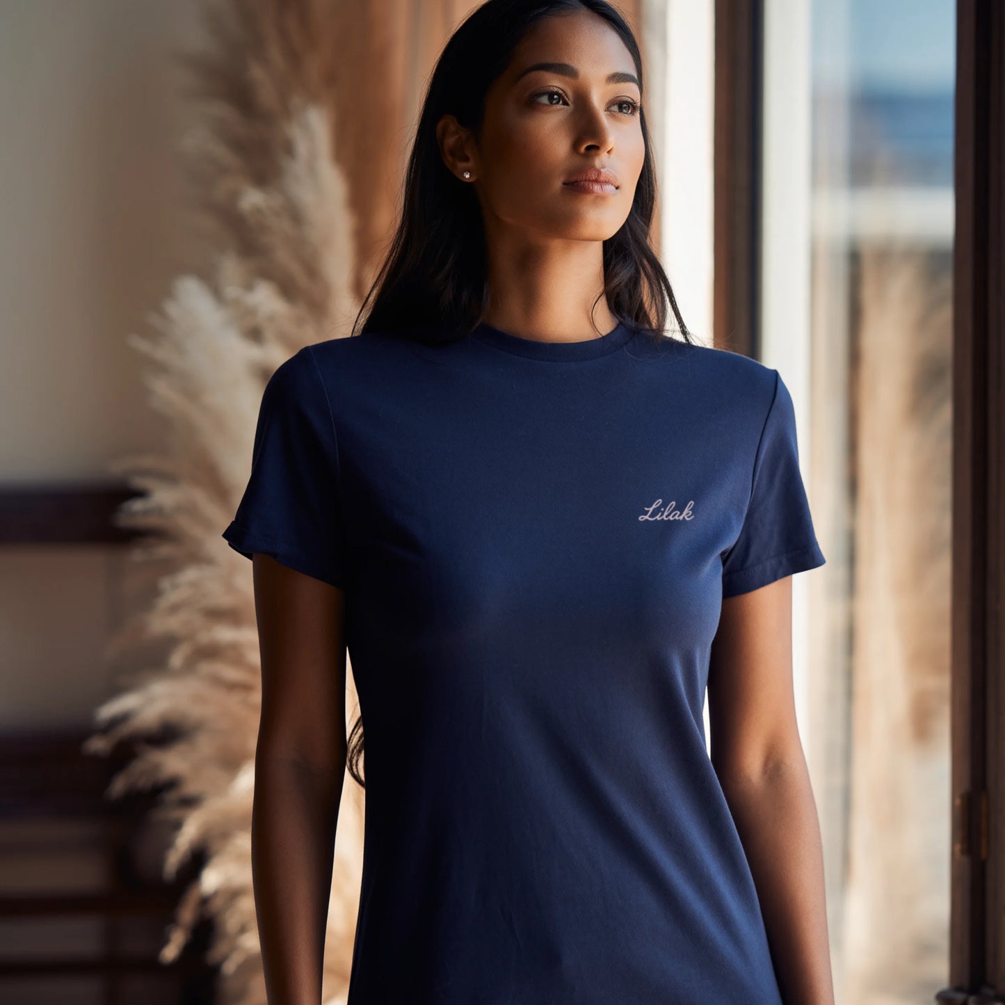 Navy blue women’s luxury Supima cotton t-shirt with refined minimal branding, elegant everyday premium fashion